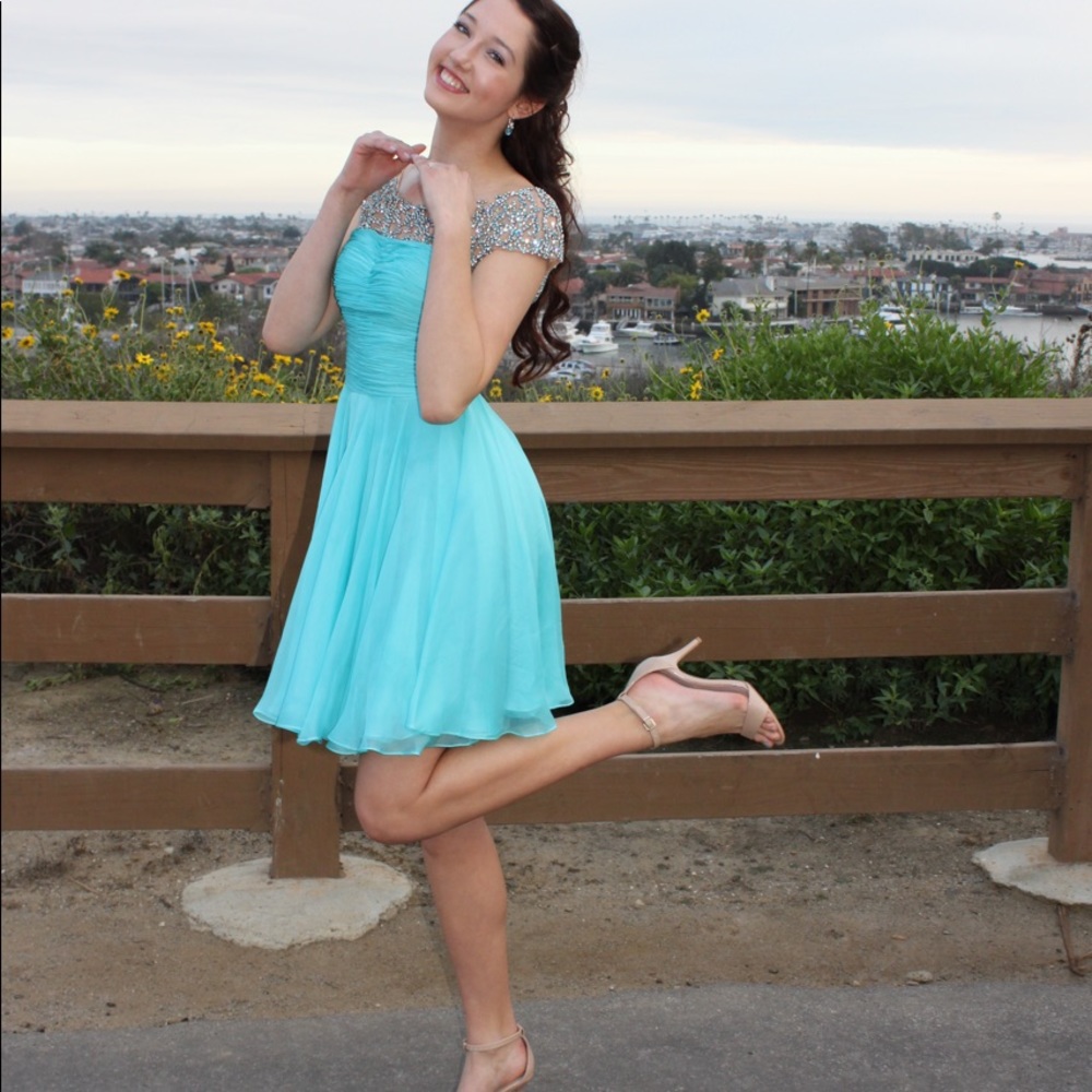 Sherri Hill! Aqua color with beaded cap sleeve detail!